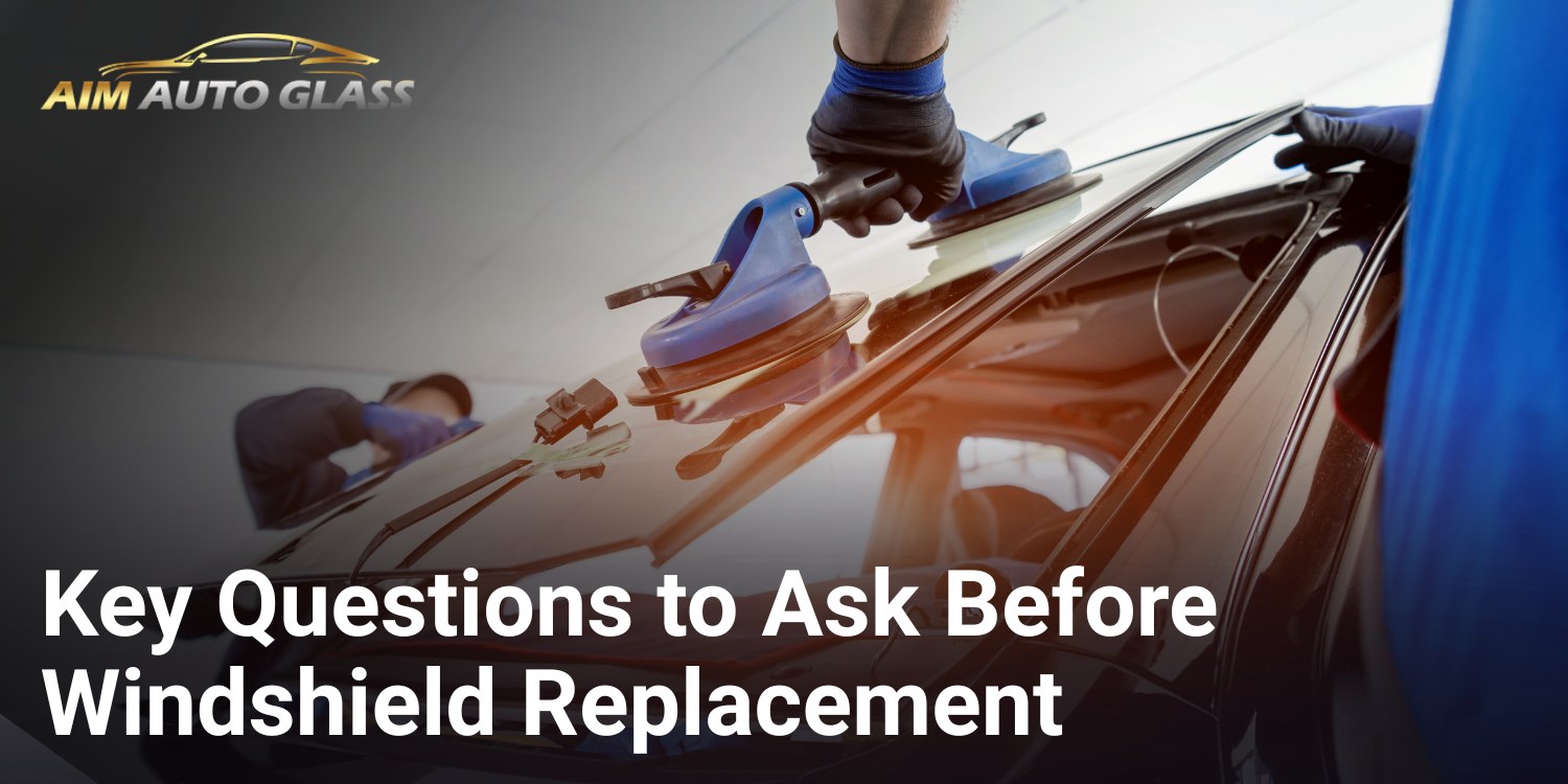 Car owner discussing windshield replacement cost, insurance coverage, and glass quality with an auto glass repair expert