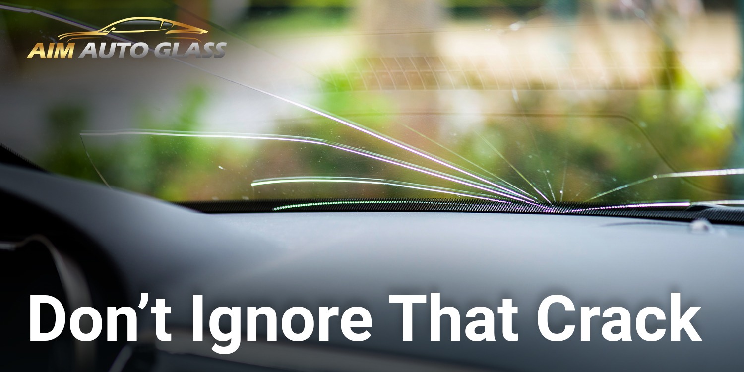 Small crack on car windshield that can lead to inspection failure